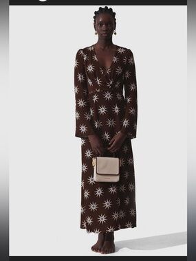 The Wolf Gang Gaia Maxi Dress with White Sunburst Print